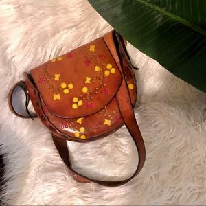 Tooled leather handbag